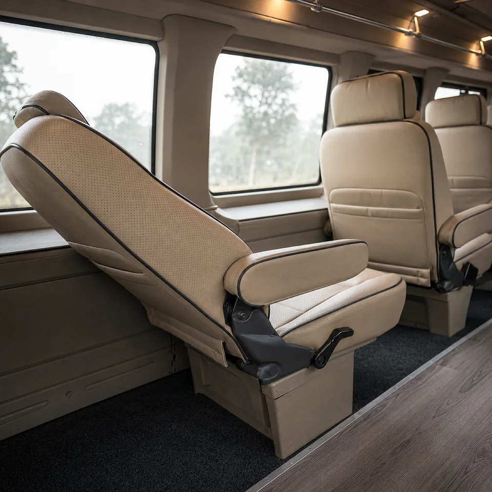 A cabin seat reclined back with its armrest down