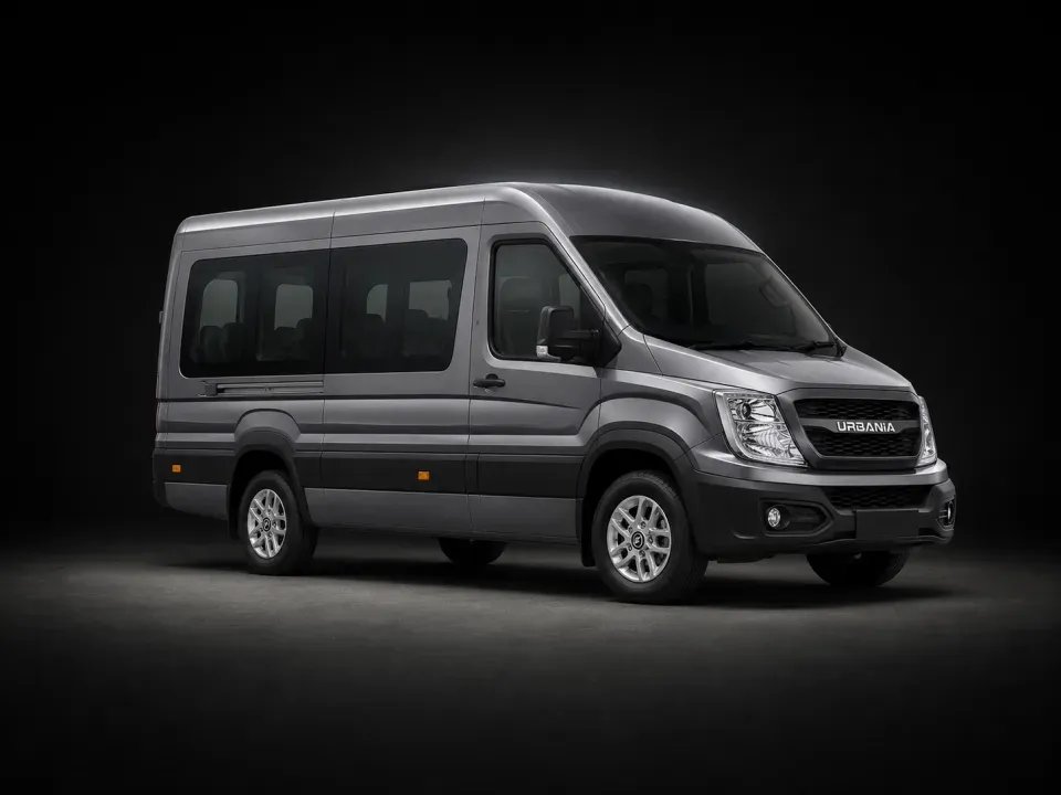 A 12 seater Force Urbania in near profile against a dark studio backdrop